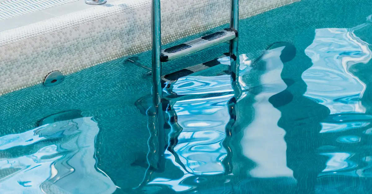 A close-up view of a metal pool ladder leading into clear blue water at the edge of a swimming pool.